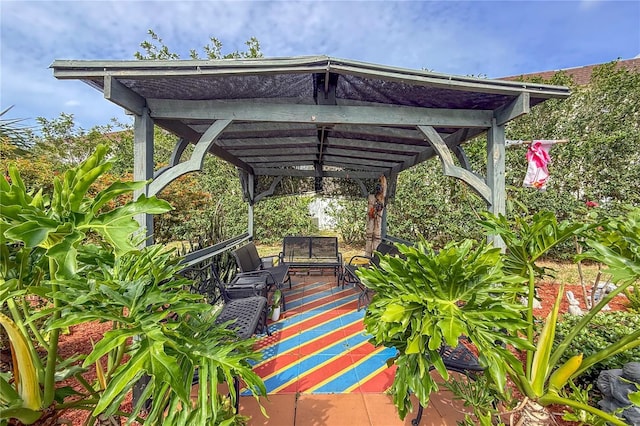 view of patio with a pergola and outdoor lounge area