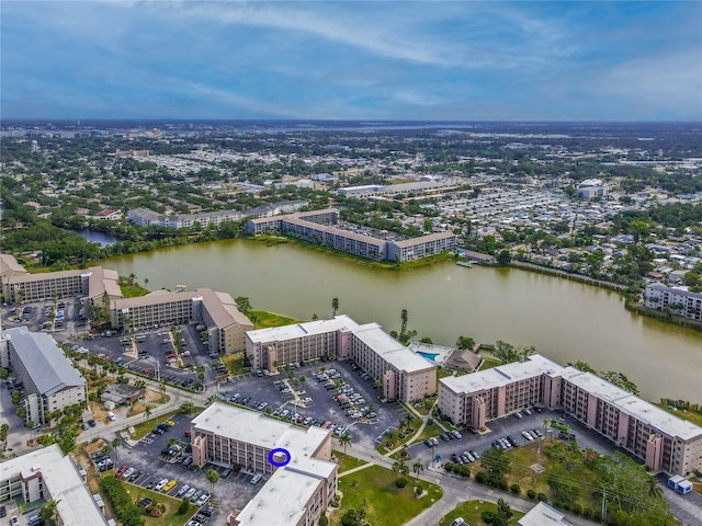 bird's eye view of a large body of water and apartment complex