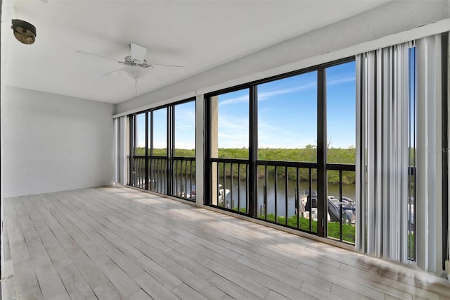 8710 54th Ave W Unit 8710, Bradenton, FL 34210 - unfurnished sunroom with a water view