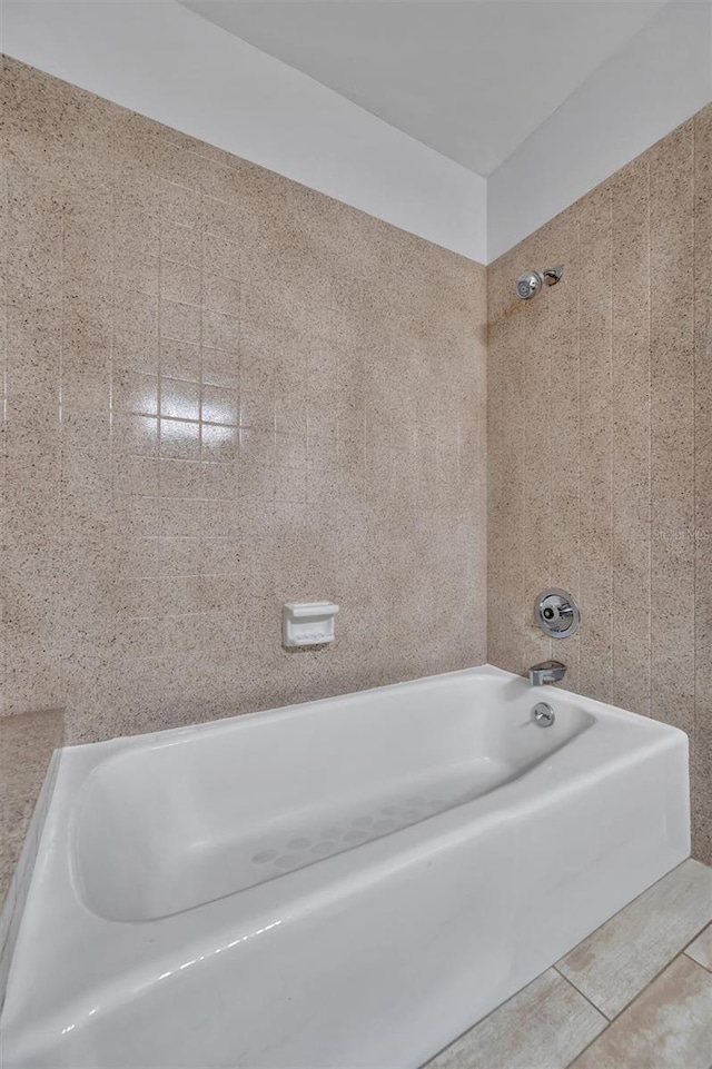 8710 54th Ave W Unit 8710, Bradenton, FL 34210 - bathroom with tub / shower combination and tile patterned flooring