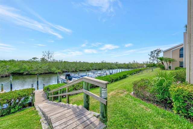 8710 54th Ave W Unit 8710, Bradenton, FL 34210 - dock with a water view and a lawn