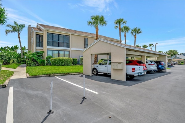 8710 54th Ave W Unit 8710, Bradenton, FL 34210 - view of building exterior with covered parking