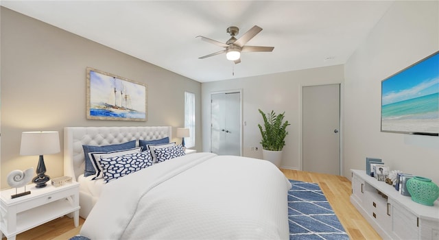 5500 Merrimac Dr, Sarasota, FL 34231 - bedroom featuring light wood finished floors and ceiling fan