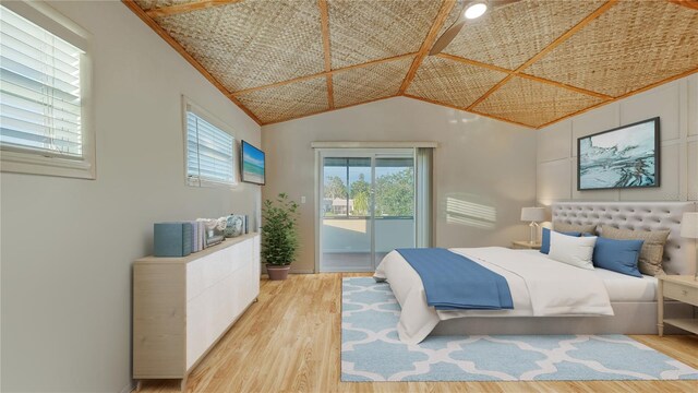 5500 Merrimac Dr, Sarasota, FL 34231 - bedroom with access to exterior, light wood finished floors, vaulted ceiling, and baseboards