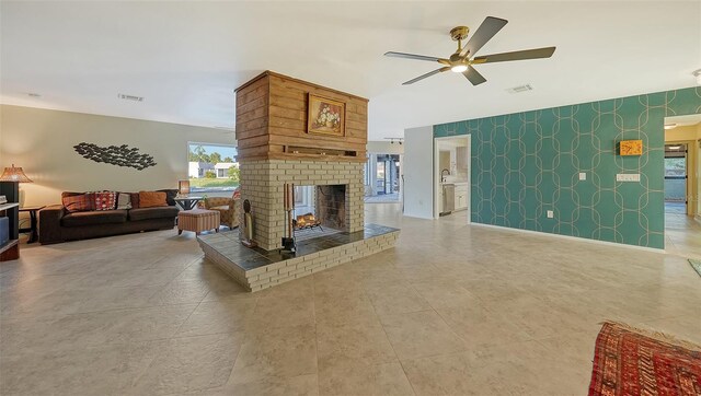 5500 Merrimac Dr, Sarasota, FL 34231 - living room with a brick fireplace, a ceiling fan, and light tile patterned floors