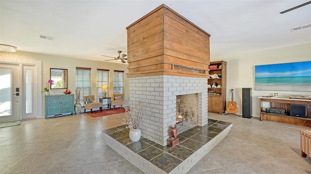 5500 Merrimac Dr, Sarasota, FL 34231 - living room with ceiling fan, a brick fireplace, and light tile patterned flooring