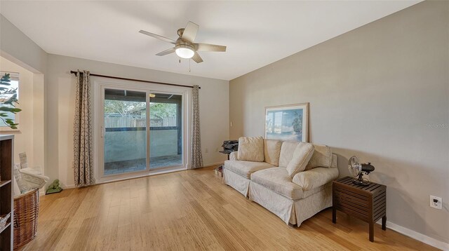 5500 Merrimac Dr, Sarasota, FL 34231 - living area featuring light wood-type flooring, a ceiling fan, and baseboards