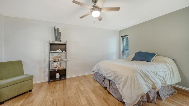 5500 Merrimac Dr, Sarasota, FL 34231 - bedroom featuring light wood finished floors, baseboards, and ceiling fan