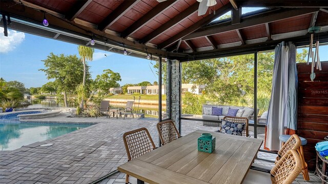 5500 Merrimac Dr, Sarasota, FL 34231 - sunroom / solarium with a hot tub and plenty of natural light