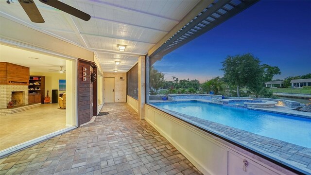 5500 Merrimac Dr, Sarasota, FL 34231 - view of pool with a ceiling fan and a pool with connected hot tub