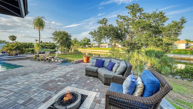 5500 Merrimac Dr, Sarasota, FL 34231 - view of patio with an outdoor living space with a fire pit and an outdoor pool