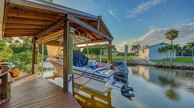 5500 Merrimac Dr, Sarasota, FL 34231 - dock area featuring boat lift and a water view