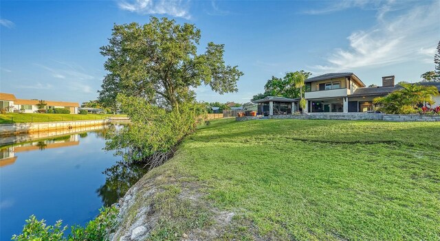 5500 Merrimac Dr, Sarasota, FL 34231 - view of grassy yard with a water view