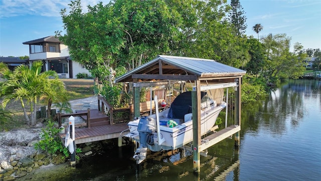 5500 Merrimac Dr, Sarasota, FL 34231 - dock area featuring boat lift and a water view