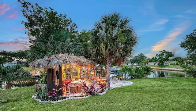 5500 Merrimac Dr, Sarasota, FL 34231 - view of green lawn featuring a water view