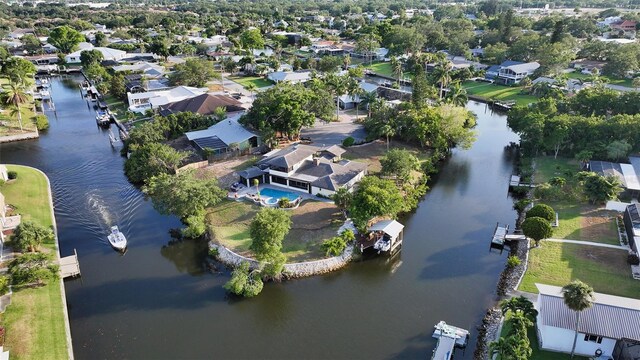 5500 Merrimac Dr, Sarasota, FL 34231 - aerial view of property and surrounding area with nearby suburban area and a large body of water