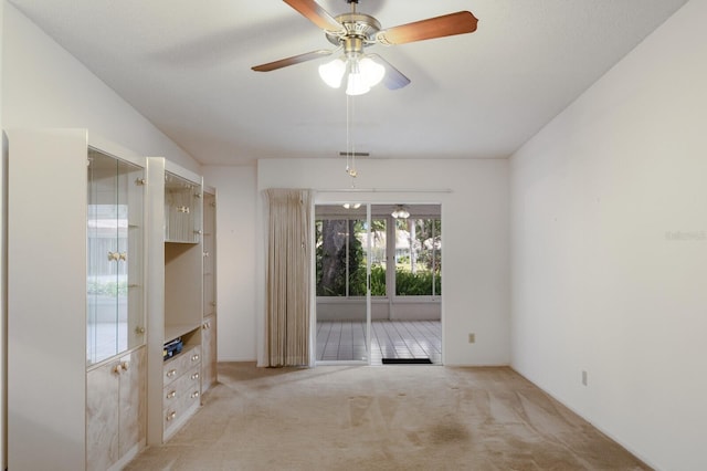 5712 Garden Lakes Dr, Bradenton, FL 34203 - unfurnished room featuring light carpet and ceiling fan