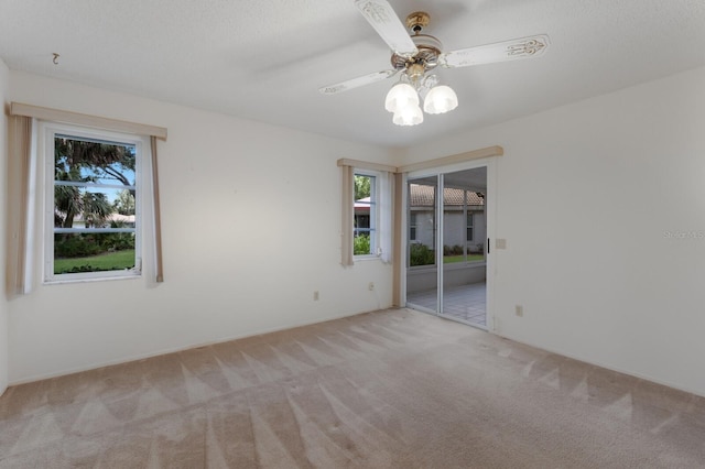 5712 Garden Lakes Dr, Bradenton, FL 34203 - carpeted empty room with a ceiling fan