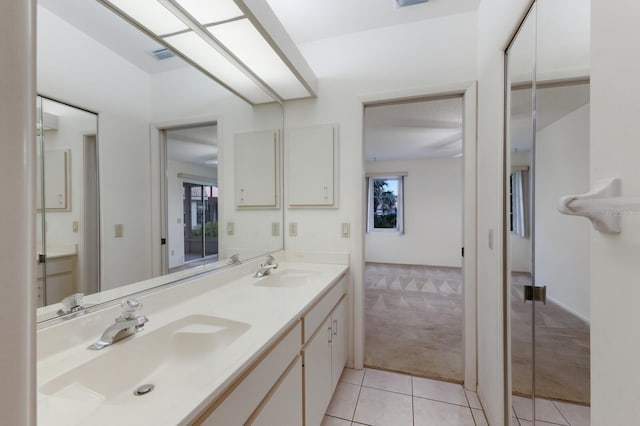 5712 Garden Lakes Dr, Bradenton, FL 34203 - bathroom with tile patterned flooring and double vanity