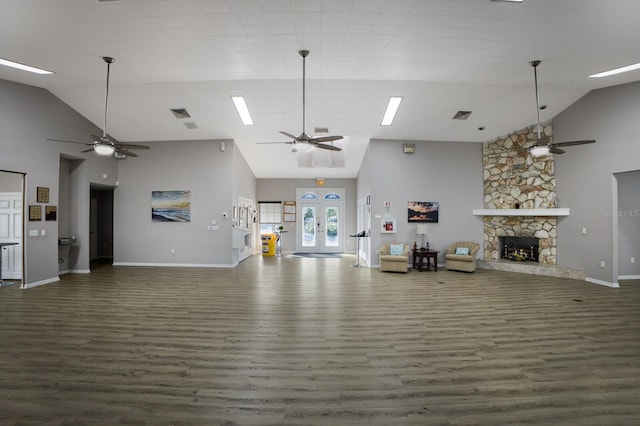 5712 Garden Lakes Dr, Bradenton, FL 34203 - living area featuring a ceiling fan, high vaulted ceiling, dark wood-style floors, and baseboards