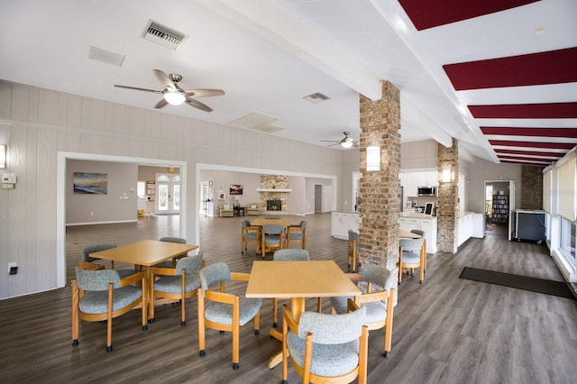 5712 Garden Lakes Dr, Bradenton, FL 34203 - dining space with ceiling fan, decorative columns, wood finished floors, and baseboards