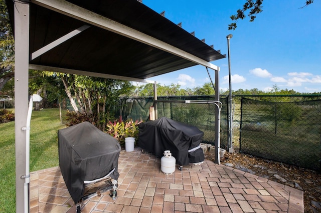 5712 Garden Lakes Dr, Bradenton, FL 34203 - view of patio with a grill
