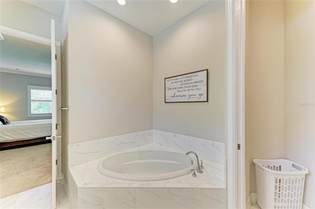 5035 Tobermory Way, Bradenton, FL 34211 - ensuite bathroom with a garden tub, recessed lighting, and baseboards
