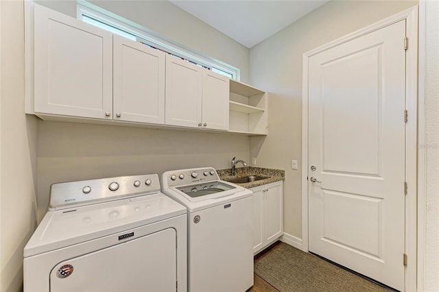 5035 Tobermory Way, Bradenton, FL 34211 - washroom with washing machine and dryer, cabinet space, wood finished floors, and baseboards