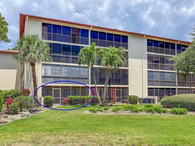 7500 40th Ave W Unit 108, Bradenton, FL 34209 - view of apartment building / complex featuring cooling unit