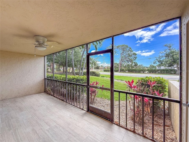 7500 40th Ave W Unit 108, Bradenton, FL 34209 - unfurnished sunroom with a ceiling fan