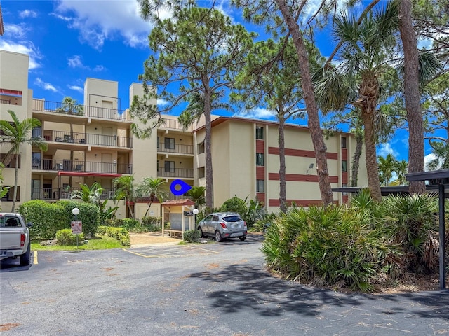7500 40th Ave W Unit 108, Bradenton, FL 34209 - view of property featuring uncovered parking