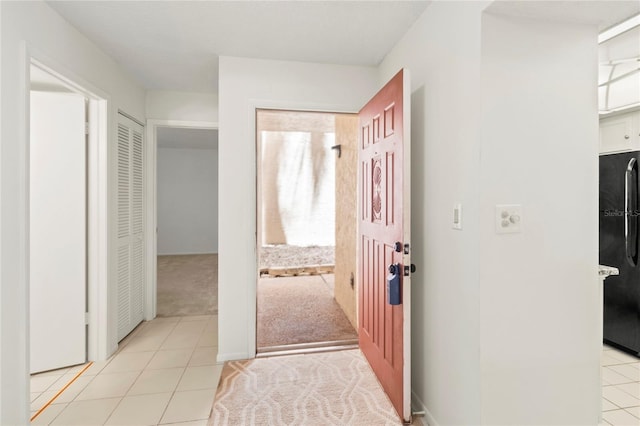 7500 40th Ave W Unit 108, Bradenton, FL 34209 - foyer with light tile patterned floors and light carpet