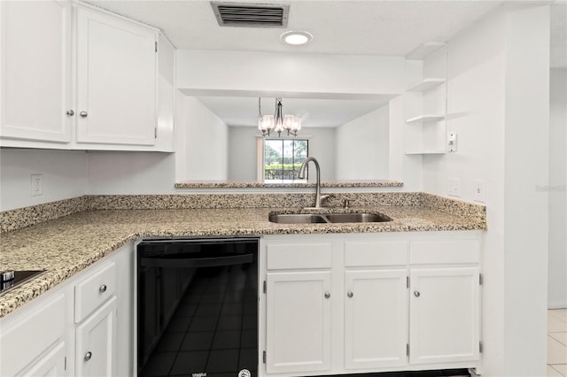 7500 40th Ave W Unit 108, Bradenton, FL 34209 - kitchen featuring black dishwasher, a sink, white cabinets, and light stone counters