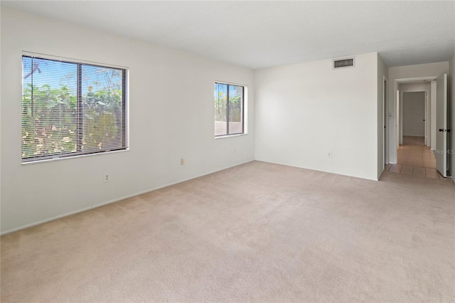 7500 40th Ave W Unit 108, Bradenton, FL 34209 - unfurnished room featuring light carpet