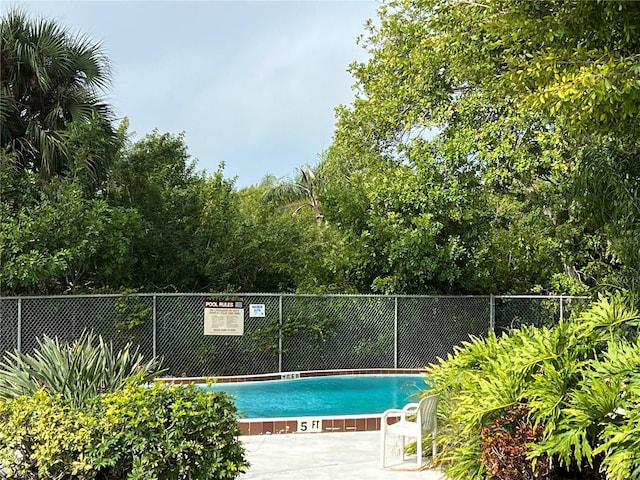 7500 40th Ave W Unit 108, Bradenton, FL 34209 - community pool featuring fence