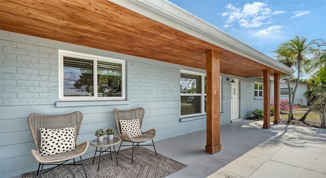 2825 Pinecrest St, Sarasota, FL 34239 - view of patio featuring covered porch