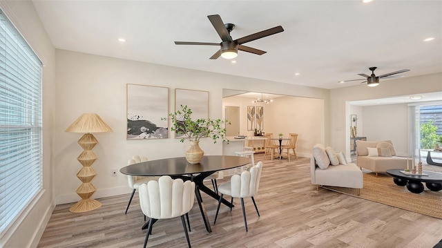 2825 Pinecrest St, Sarasota, FL 34239 - dining room featuring light wood-style flooring, a ceiling fan, recessed lighting, and baseboards