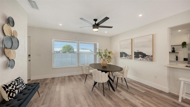 2825 Pinecrest St, Sarasota, FL 34239 - dining room featuring a ceiling fan, light wood-style flooring, baseboards, and recessed lighting