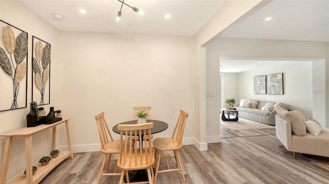 2825 Pinecrest St, Sarasota, FL 34239 - dining space with wood finished floors, baseboards, and recessed lighting