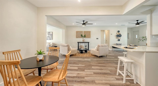 2825 Pinecrest St, Sarasota, FL 34239 - dining room featuring ceiling fan, light wood finished floors, and recessed lighting
