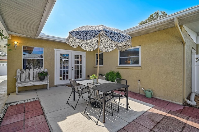 2708 27th Avenue Dr W, Bradenton, FL 34205 - view of patio / terrace featuring french doors and outdoor dining space