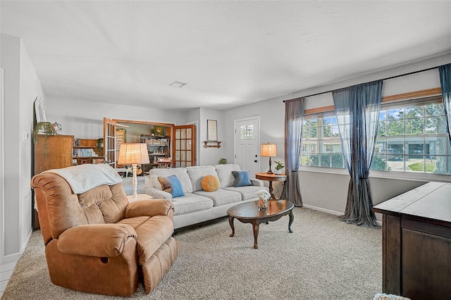 2708 27th Avenue Dr W, Bradenton, FL 34205 - living room featuring light carpet and baseboards