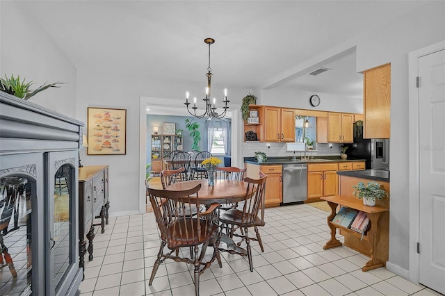 2708 27th Avenue Dr W, Bradenton, FL 34205 - dining room featuring a chandelier and light tile patterned flooring
