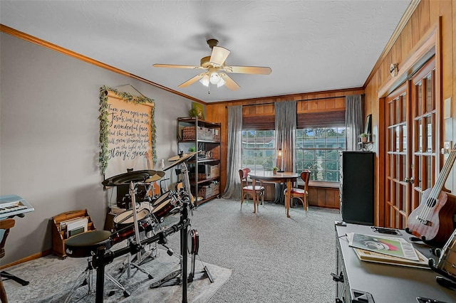 2708 27th Avenue Dr W, Bradenton, FL 34205 - office space with crown molding, carpet, a ceiling fan, and wood walls