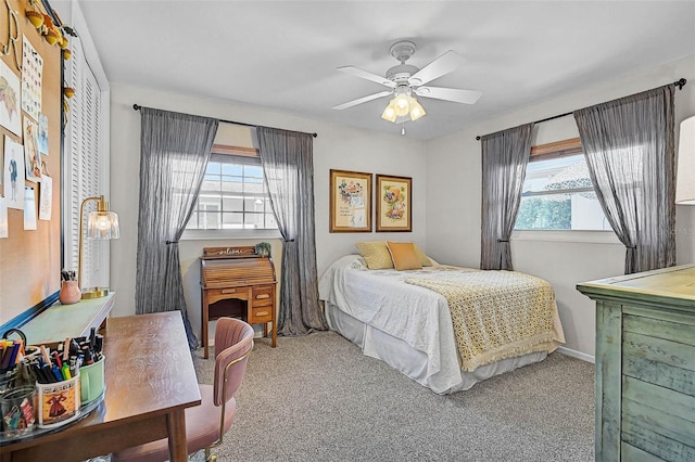 2708 27th Avenue Dr W, Bradenton, FL 34205 - carpeted bedroom with multiple windows and ceiling fan