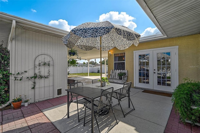 2708 27th Avenue Dr W, Bradenton, FL 34205 - view of patio / terrace with french doors and outdoor dining space