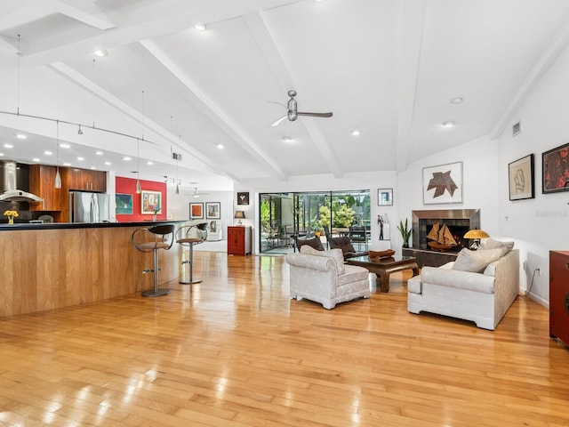 3905 Country View Dr, Sarasota, FL 34233 - living area with light wood-style floors, ceiling fan, a tile fireplace, and recessed lighting