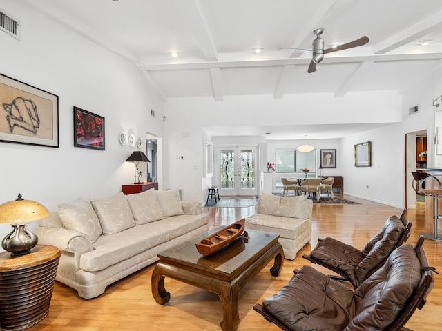 3905 Country View Dr, Sarasota, FL 34233 - living room with light wood-style floors, ceiling fan, and french doors