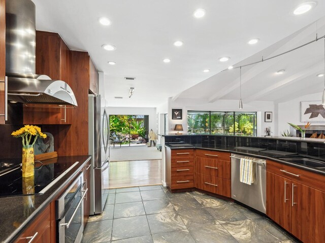 3905 Country View Dr, Sarasota, FL 34233 - kitchen featuring appliances with stainless steel finishes, wall chimney exhaust hood, recessed lighting, modern cabinets, and dark stone counters