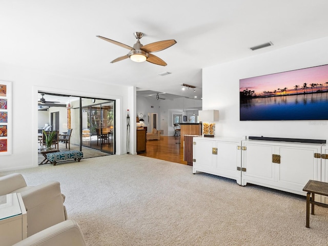 3905 Country View Dr, Sarasota, FL 34233 - living area featuring light carpet and ceiling fan
